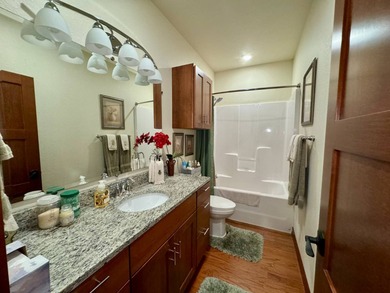 Built in 2021, this three-bedroom, two-bathroom back-lot lake on Roy View Golf Course in South Dakota - for sale on GolfHomes.com, golf home, golf lot