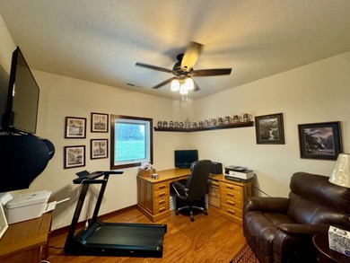 Built in 2021, this three-bedroom, two-bathroom back-lot lake on Roy View Golf Course in South Dakota - for sale on GolfHomes.com, golf home, golf lot