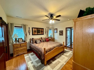 Built in 2021, this three-bedroom, two-bathroom back-lot lake on Roy View Golf Course in South Dakota - for sale on GolfHomes.com, golf home, golf lot