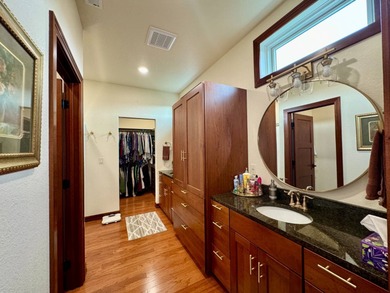 Built in 2021, this three-bedroom, two-bathroom back-lot lake on Roy View Golf Course in South Dakota - for sale on GolfHomes.com, golf home, golf lot