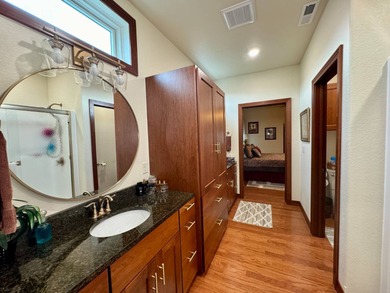 Built in 2021, this three-bedroom, two-bathroom back-lot lake on Roy View Golf Course in South Dakota - for sale on GolfHomes.com, golf home, golf lot