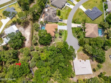 Tucked away at the end of a quiet cul-de-sac, this oversized on The Grand Club - Pine Lakes Course in Florida - for sale on GolfHomes.com, golf home, golf lot