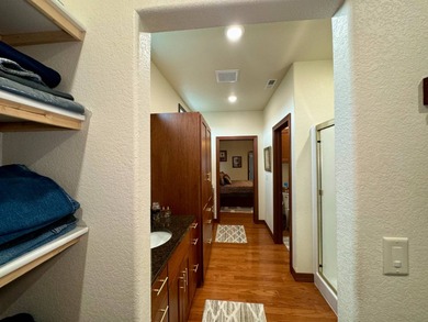 Built in 2021, this three-bedroom, two-bathroom back-lot lake on Roy View Golf Course in South Dakota - for sale on GolfHomes.com, golf home, golf lot