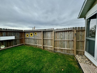 Built in 2021, this three-bedroom, two-bathroom back-lot lake on Roy View Golf Course in South Dakota - for sale on GolfHomes.com, golf home, golf lot