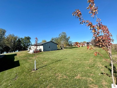 Built in 2021, this three-bedroom, two-bathroom back-lot lake on Roy View Golf Course in South Dakota - for sale on GolfHomes.com, golf home, golf lot