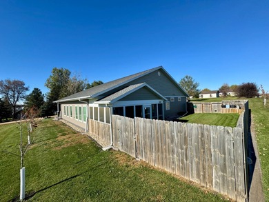 Built in 2021, this three-bedroom, two-bathroom back-lot lake on Roy View Golf Course in South Dakota - for sale on GolfHomes.com, golf home, golf lot