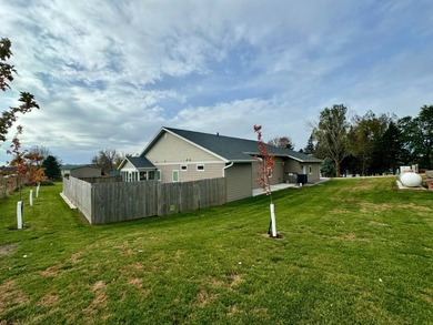 Built in 2021, this three-bedroom, two-bathroom back-lot lake on Roy View Golf Course in South Dakota - for sale on GolfHomes.com, golf home, golf lot