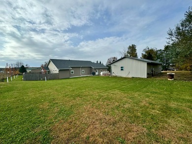 Built in 2021, this three-bedroom, two-bathroom back-lot lake on Roy View Golf Course in South Dakota - for sale on GolfHomes.com, golf home, golf lot