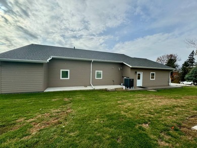 Built in 2021, this three-bedroom, two-bathroom back-lot lake on Roy View Golf Course in South Dakota - for sale on GolfHomes.com, golf home, golf lot