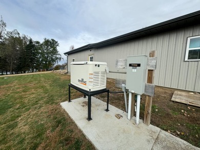 Built in 2021, this three-bedroom, two-bathroom back-lot lake on Roy View Golf Course in South Dakota - for sale on GolfHomes.com, golf home, golf lot