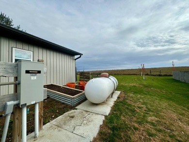 Built in 2021, this three-bedroom, two-bathroom back-lot lake on Roy View Golf Course in South Dakota - for sale on GolfHomes.com, golf home, golf lot