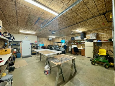 Built in 2021, this three-bedroom, two-bathroom back-lot lake on Roy View Golf Course in South Dakota - for sale on GolfHomes.com, golf home, golf lot