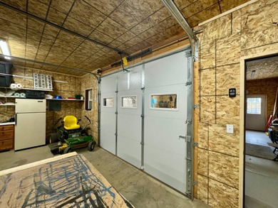 Built in 2021, this three-bedroom, two-bathroom back-lot lake on Roy View Golf Course in South Dakota - for sale on GolfHomes.com, golf home, golf lot