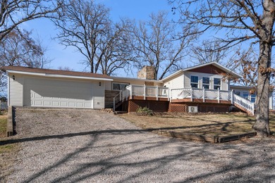 Spring has arrived & lake life is calling @ 132 Lakeshore Dr in on Kimberling City Golf Club in Missouri - for sale on GolfHomes.com, golf home, golf lot