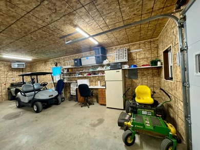 Built in 2021, this three-bedroom, two-bathroom back-lot lake on Roy View Golf Course in South Dakota - for sale on GolfHomes.com, golf home, golf lot