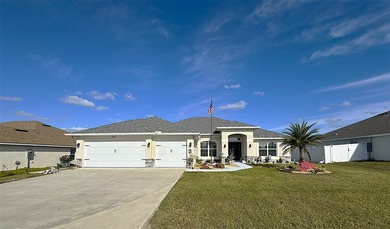 Situated within the desirable gated community of Summercrest on Baseline Golf Course in Florida - for sale on GolfHomes.com, golf home, golf lot