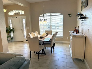 Situated within the desirable gated community of Summercrest on Baseline Golf Course in Florida - for sale on GolfHomes.com, golf home, golf lot