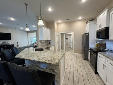 Situated within the desirable gated community of Summercrest on Baseline Golf Course in Florida - for sale on GolfHomes.com, golf home, golf lot