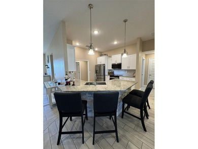 Situated within the desirable gated community of Summercrest on Baseline Golf Course in Florida - for sale on GolfHomes.com, golf home, golf lot