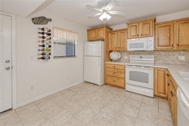 Pride of ownership shows in this well- kept MOVE-IN READY second on Kingsway Country Club in Florida - for sale on GolfHomes.com, golf home, golf lot