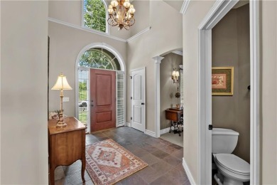 This stunning home offers both elegance and comfort. It has on Golf Club of Creekmoor in Missouri - for sale on GolfHomes.com, golf home, golf lot