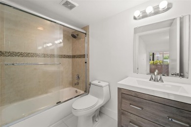 Resort-Style Living in the Heart of Doral. Light-filled  move-in on Jim McLean Signature Course in Florida - for sale on GolfHomes.com, golf home, golf lot