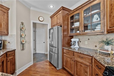 This stunning home offers both elegance and comfort. It has on Golf Club of Creekmoor in Missouri - for sale on GolfHomes.com, golf home, golf lot