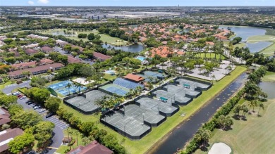 Resort-Style Living in the Heart of Doral. Light-filled  move-in on Jim McLean Signature Course in Florida - for sale on GolfHomes.com, golf home, golf lot