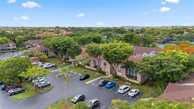 Resort-Style Living in the Heart of Doral. Light-filled  move-in on Jim McLean Signature Course in Florida - for sale on GolfHomes.com, golf home, golf lot