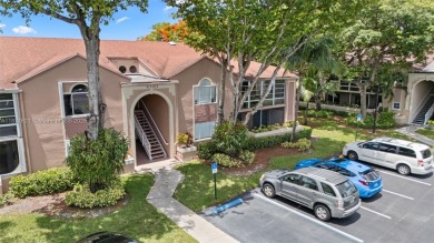 Resort-Style Living in the Heart of Doral. Light-filled  move-in on Jim McLean Signature Course in Florida - for sale on GolfHomes.com, golf home, golf lot