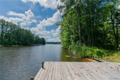 Nice one-story waterfront cottage.  Lake Caroline is on Pendleton Golf Club in Virginia - for sale on GolfHomes.com, golf home, golf lot