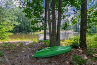 Nice one-story waterfront cottage.  Lake Caroline is on Pendleton Golf Club in Virginia - for sale on GolfHomes.com, golf home, golf lot