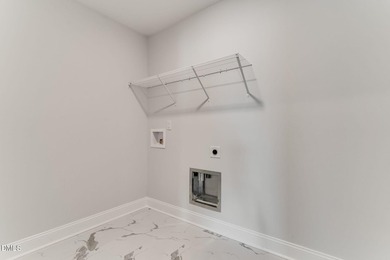 This 3 bedroom, 2.5 bath townhome is located in the beautiful on Gates Four Golf and Country Club in North Carolina - for sale on GolfHomes.com, golf home, golf lot