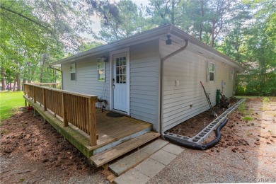 Nice one-story waterfront cottage.  Lake Caroline is on Pendleton Golf Club in Virginia - for sale on GolfHomes.com, golf home, golf lot