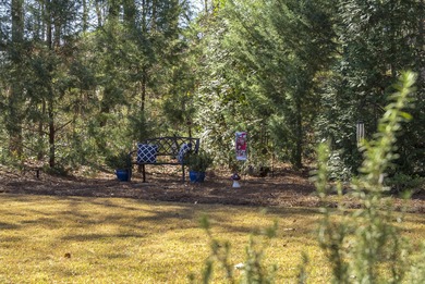 Enjoy privacy, security, community & lifestyle at home in this on The Reserve Club At Woodside Plantation in South Carolina - for sale on GolfHomes.com, golf home, golf lot