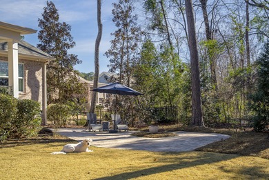 Enjoy privacy, security, community & lifestyle at home in this on The Reserve Club At Woodside Plantation in South Carolina - for sale on GolfHomes.com, golf home, golf lot