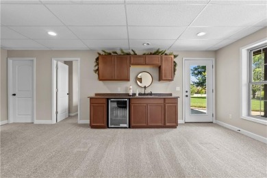 This stunning home offers both elegance and comfort. It has on Golf Club of Creekmoor in Missouri - for sale on GolfHomes.com, golf home, golf lot