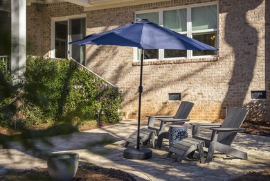 Enjoy privacy, security, community & lifestyle at home in this on The Reserve Club At Woodside Plantation in South Carolina - for sale on GolfHomes.com, golf home, golf lot