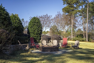 Enjoy privacy, security, community & lifestyle at home in this on The Reserve Club At Woodside Plantation in South Carolina - for sale on GolfHomes.com, golf home, golf lot