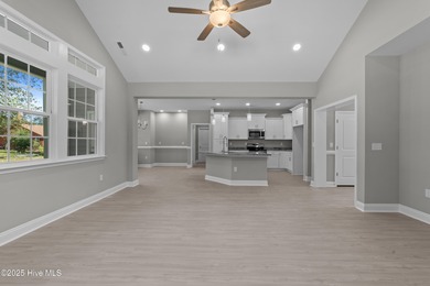 This NEW CONSTRUCTION, single level CRAFTSMAN style home is on Oyster Bay Golf Links in North Carolina - for sale on GolfHomes.com, golf home, golf lot