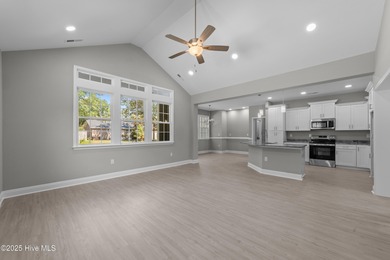 This NEW CONSTRUCTION, single level CRAFTSMAN style home is on Oyster Bay Golf Links in North Carolina - for sale on GolfHomes.com, golf home, golf lot