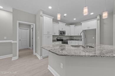 This NEW CONSTRUCTION, single level CRAFTSMAN style home is on Oyster Bay Golf Links in North Carolina - for sale on GolfHomes.com, golf home, golf lot