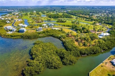 Build your dream home on a spectacular .39 acre waterfront lot on Lemon Bay Golf Club in Florida - for sale on GolfHomes.com, golf home, golf lot