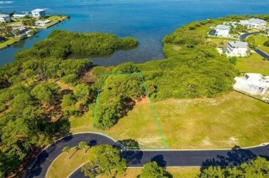 Build your dream home on a spectacular .39 acre waterfront lot on Lemon Bay Golf Club in Florida - for sale on GolfHomes.com, golf home, golf lot