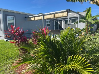 The Lot Rent for this home is $1,075.00 monthly.  Wow, Showcase on Del Tura Golf and Country Club in Florida - for sale on GolfHomes.com, golf home, golf lot