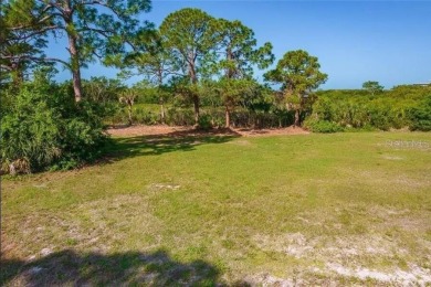 Build your dream home on a spectacular .39 acre waterfront lot on Lemon Bay Golf Club in Florida - for sale on GolfHomes.com, golf home, golf lot