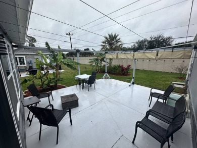 The Lot Rent for this home is $1,075.00 monthly.  Wow, Showcase on Del Tura Golf and Country Club in Florida - for sale on GolfHomes.com, golf home, golf lot
