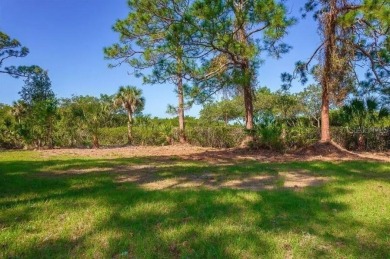 Build your dream home on a spectacular .39 acre waterfront lot on Lemon Bay Golf Club in Florida - for sale on GolfHomes.com, golf home, golf lot