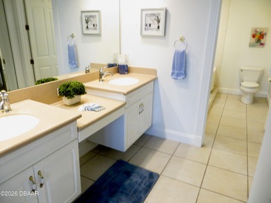 Bright open plan corner unit has TWO balconies overlooking woods on Harbour Village Golf and Yacht Club in Florida - for sale on GolfHomes.com, golf home, golf lot