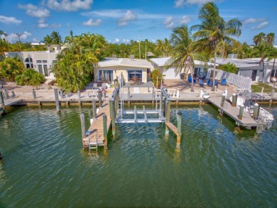 Dockage defines the lifestyle at this updated two-bedroom on Key Colony Beach Golf Course in Florida - for sale on GolfHomes.com, golf home, golf lot